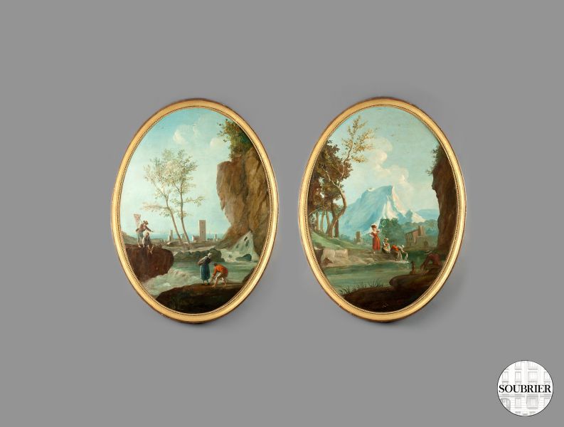 Pair of oval pictures of a landscape