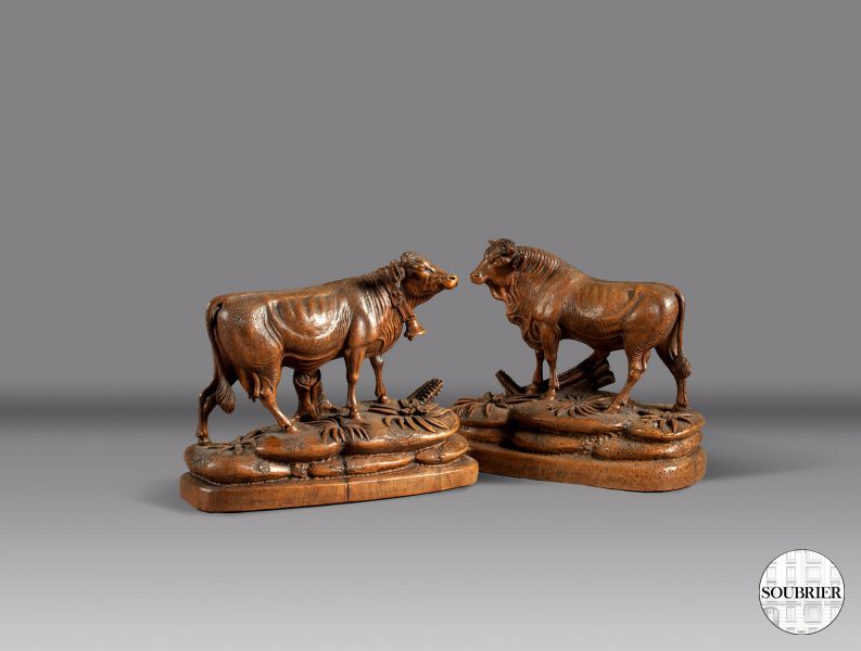 Wooden cow and bull