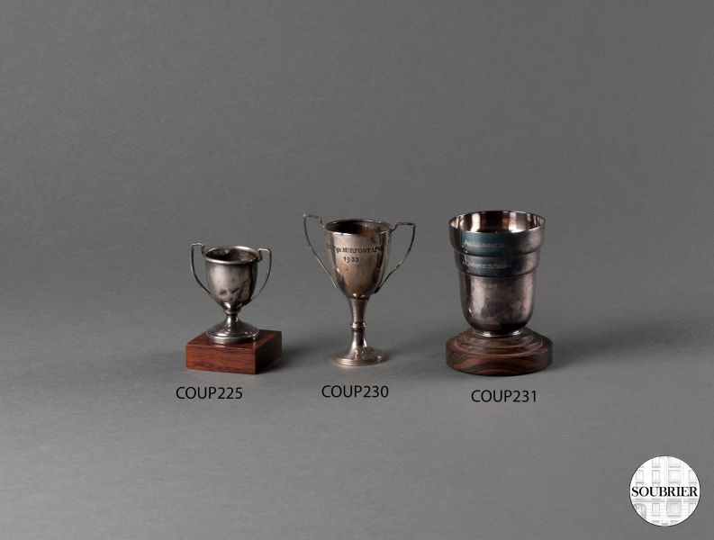 Three silver-plated sport cups
