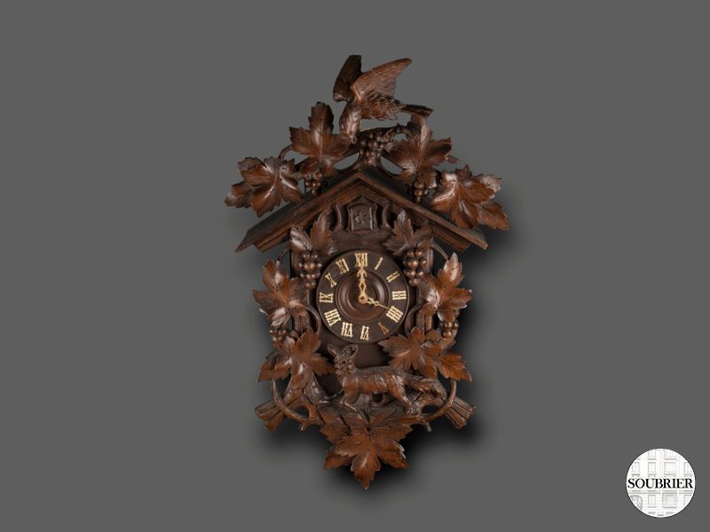Swiss cuckoo clock with a fox
