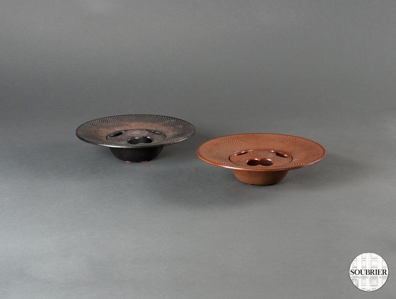 Two brown ashtrays