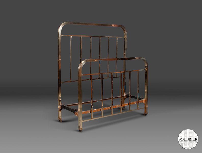A 1930s brass bed