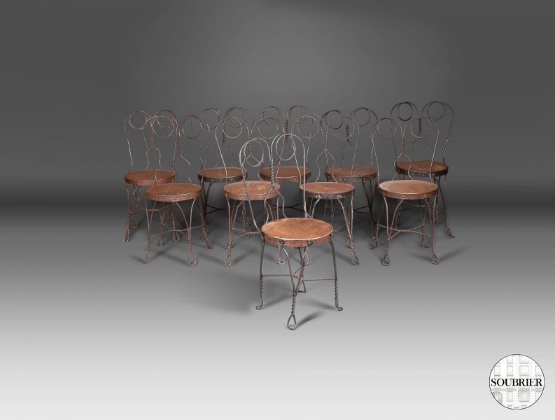 Ten wood & wrought iron chairs