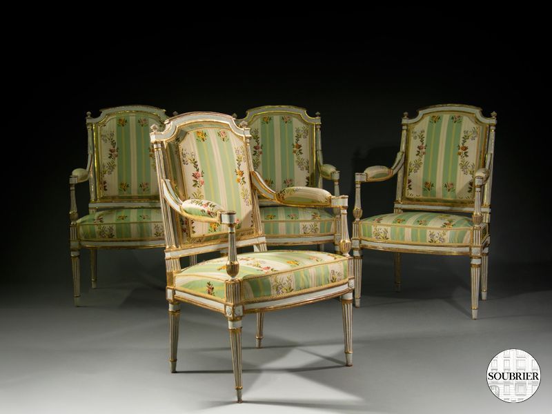 Quatre fauteuils Louis XVI blanc et or