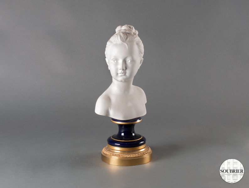 Bust of a young girl in biscuit