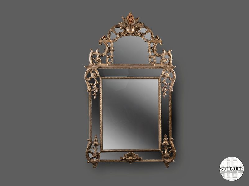 Golden sculpted mirror