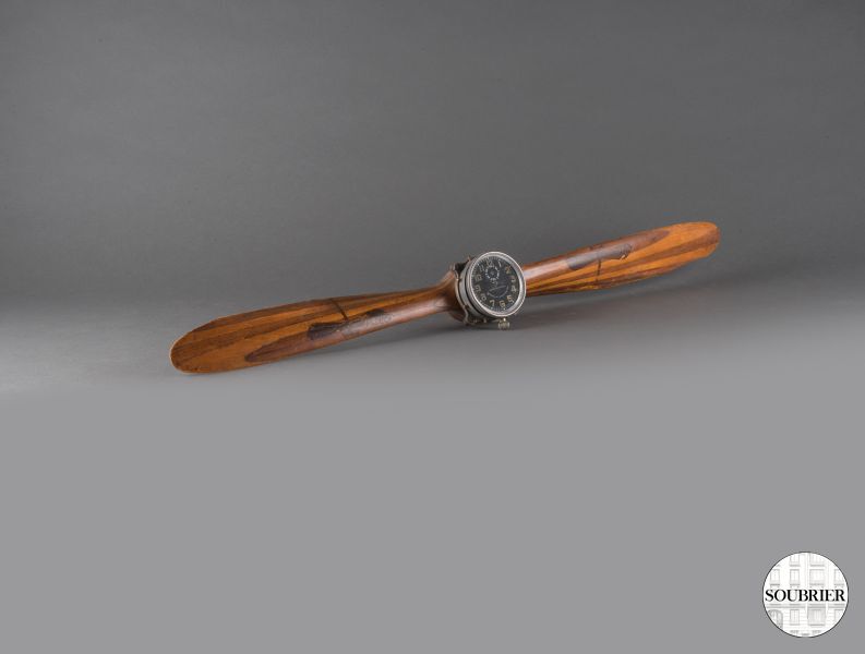 Wooden propeller with small clock