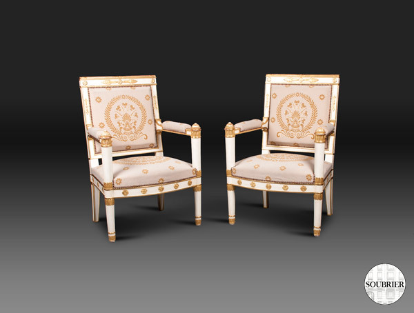 White & gold lacquered armchairs