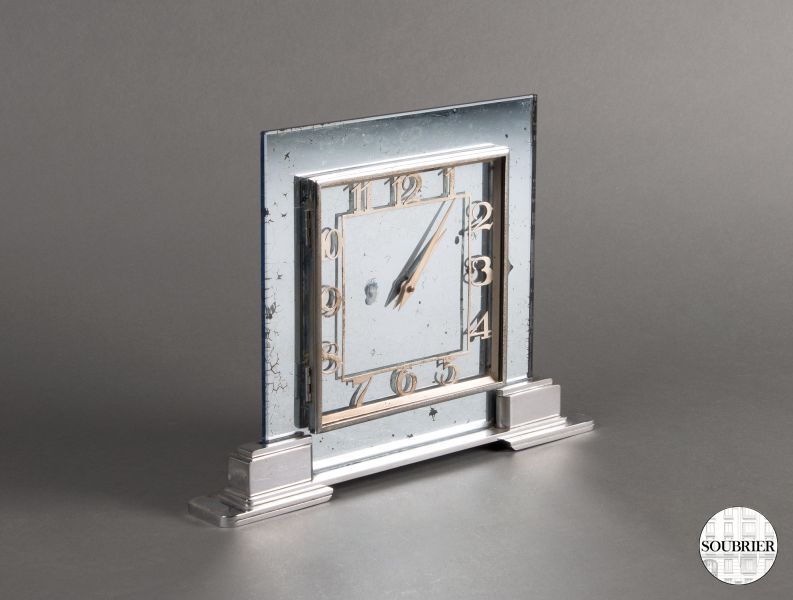 Glass and chrome-plated small clock