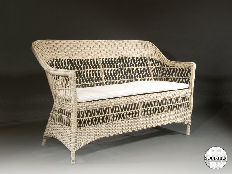 Canapé en rotin avec coussin