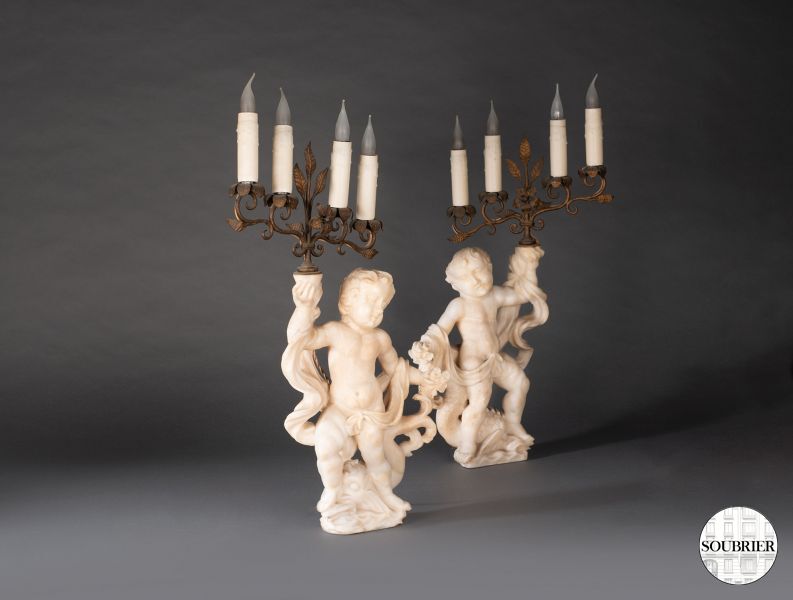 Pair of Cupid candelabras