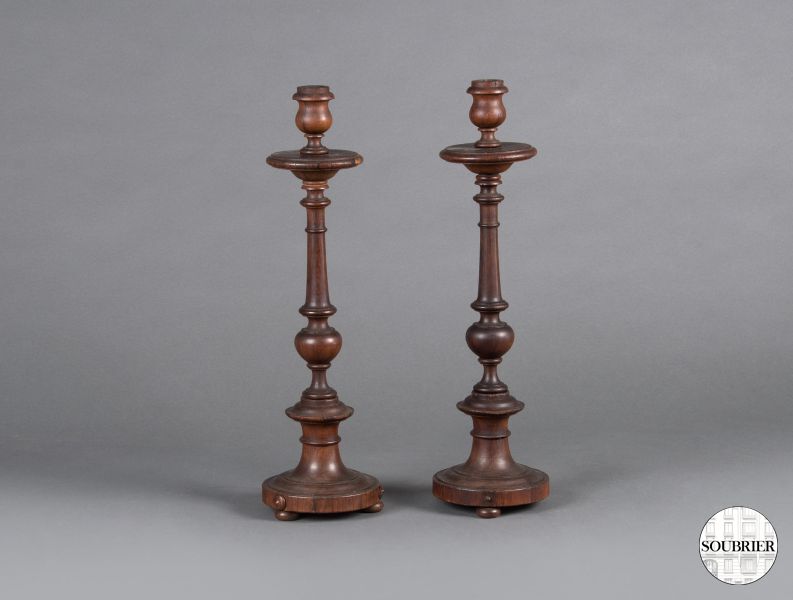 Pair of rosewood candlesticks