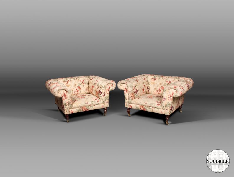 Large floral Chesterfield armchairs