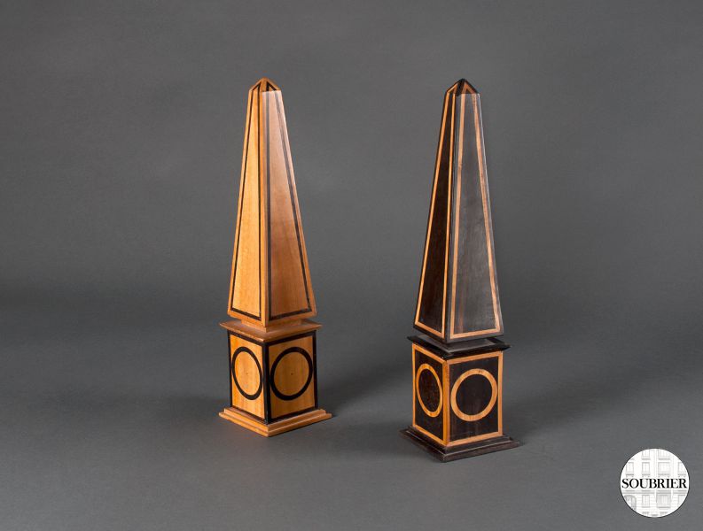 Pair of wooden obelisks