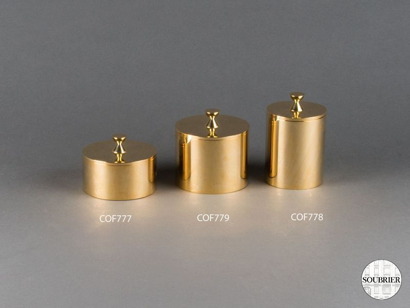 3 round brass boxes