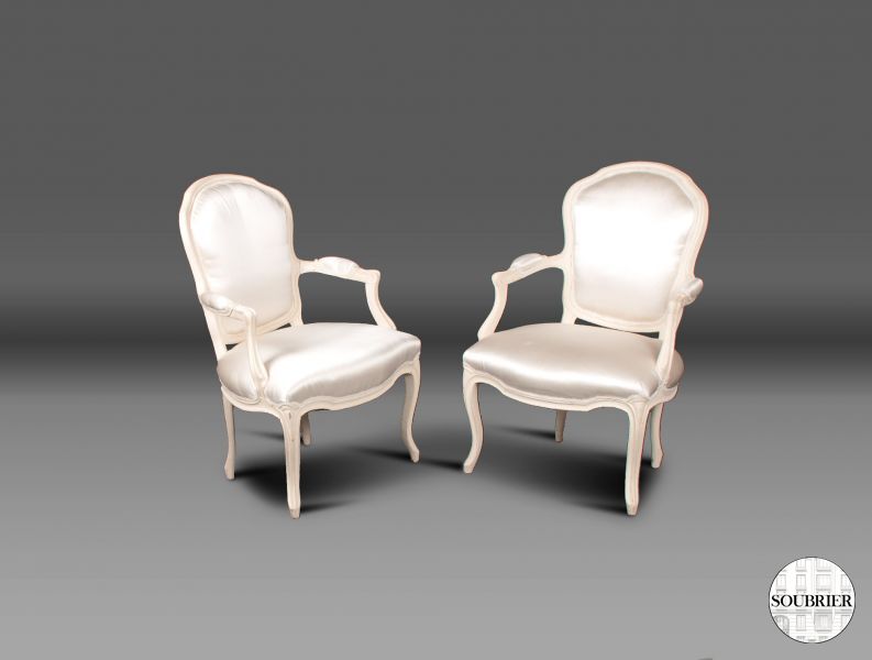 white Louis XVI cabriolet chairs