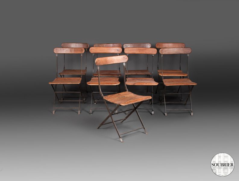 Nine folding chairs