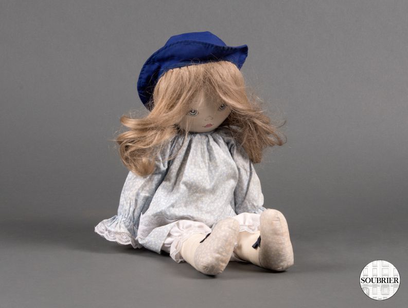 Blonde hair doll with blue hat