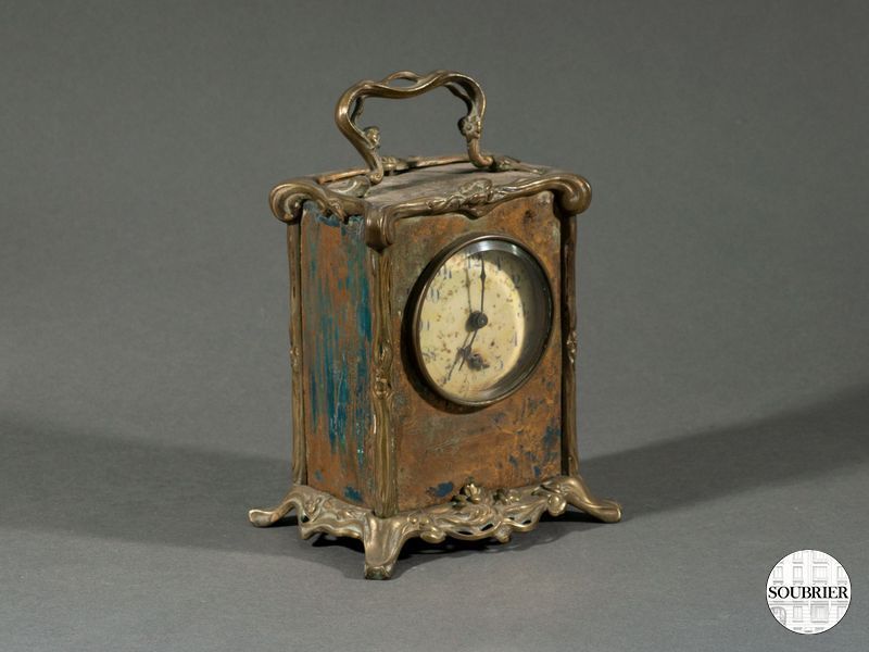 Petite pendule décor rocaille