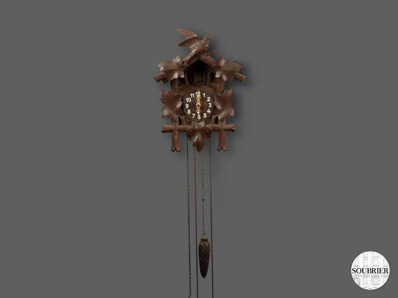 Carved wooden cuckoo clock
