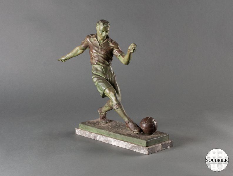 Footballeur en bronze sur socle