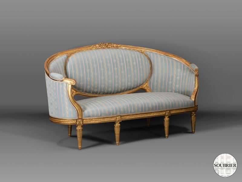 Sofa in carved and gilded wood