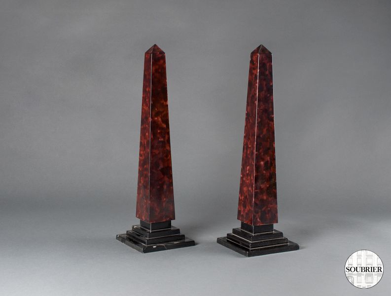 Pair of resin obelisks