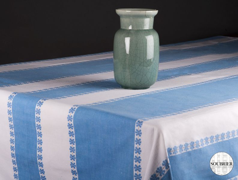 White and blue striped tablecloth