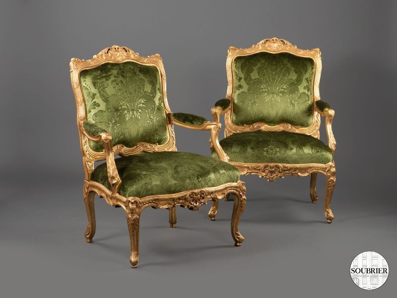 Deux fauteuils LXV dorés