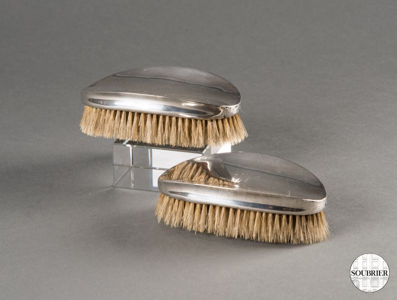 Pair of silver clothes brushes