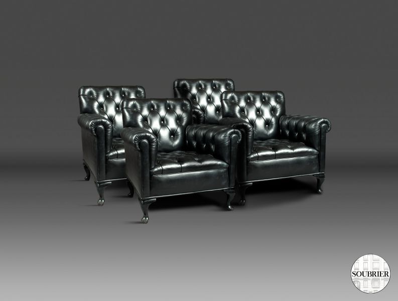 4 black Chesterfield armchairs