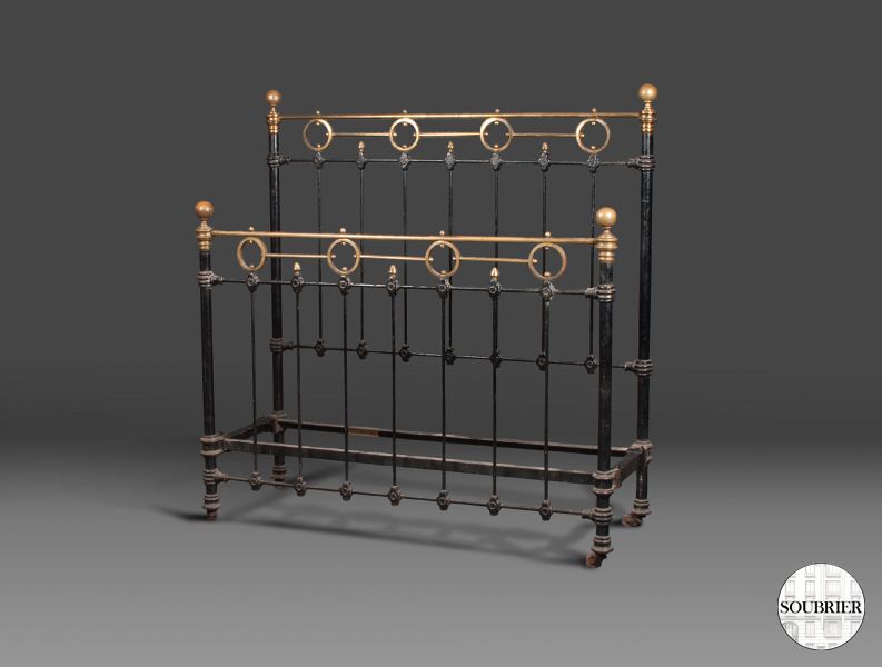 Black wrought iron bed
