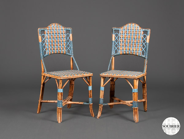 Pair of blue rattan chairs