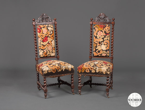 High-backed chairs and tapestry