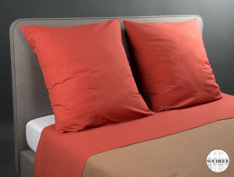 Pair of brick red top sheets