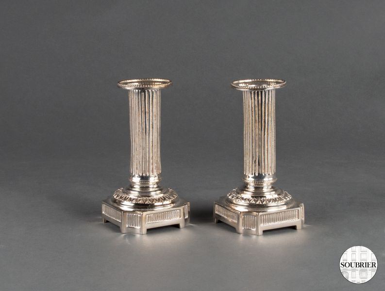 Two small candle sticks