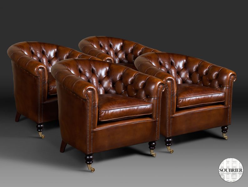 4 brown chesterfield armchairs