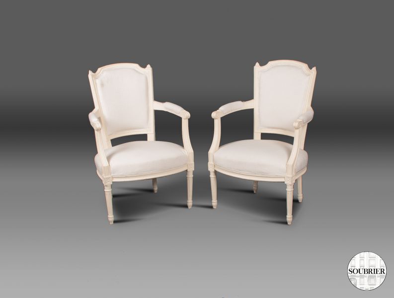 white Louis XVI cabriolet chairs