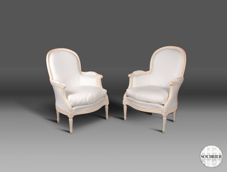 Pair of white Louis XVI low chairs
