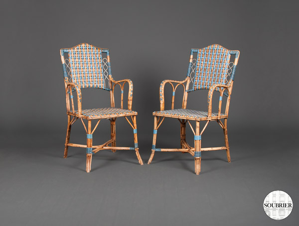 Pair of blue rattan chairs