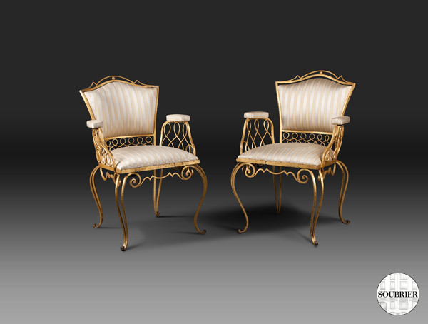 Pair of gilt wrought iron armchairs